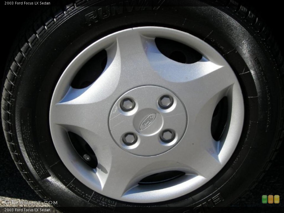 2003 Ford Focus LX Sedan Wheel and Tire Photo #46189702