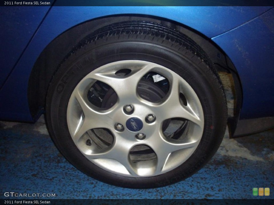 2011 Ford Fiesta SEL Sedan Wheel and Tire Photo #46385883