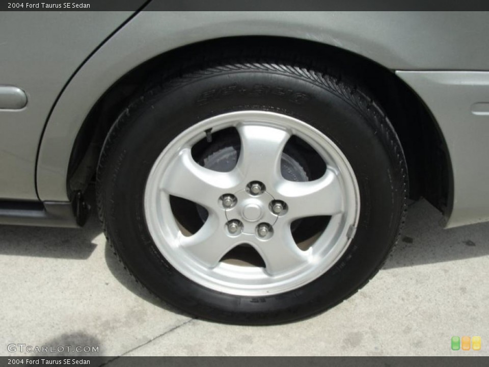 2004 Ford Taurus SE Sedan Wheel and Tire Photo #46481526