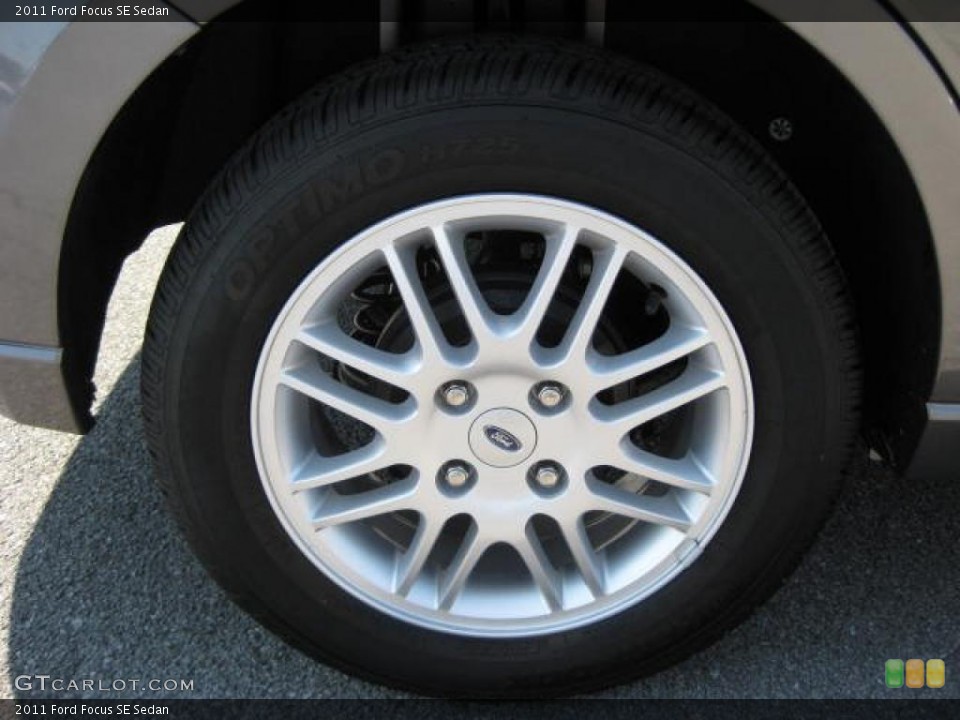 2011 Ford Focus SE Sedan Wheel and Tire Photo #46647362