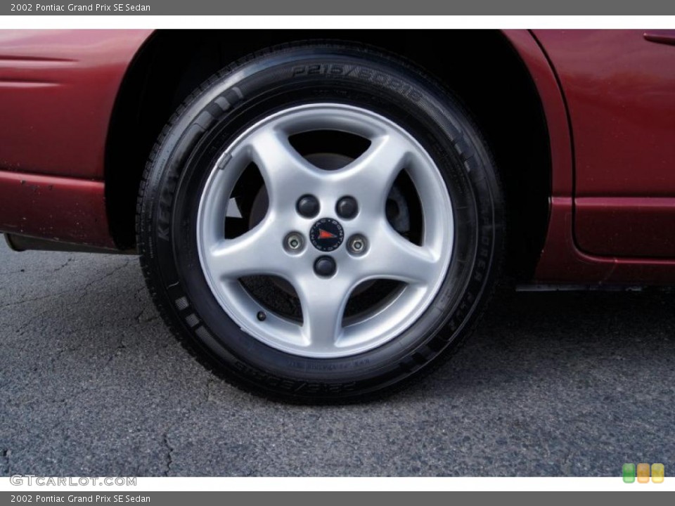 2002 Pontiac Grand Prix SE Sedan Wheel and Tire Photo #46832595