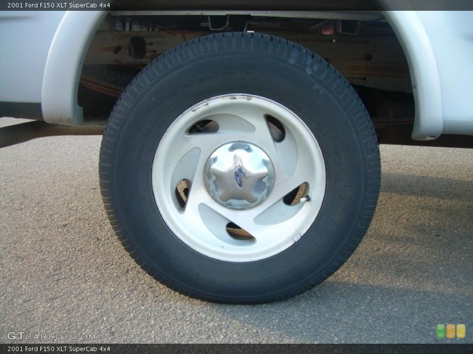 2001 Ford F150 XLT SuperCab 4x4 Wheel and Tire Photo #46948020