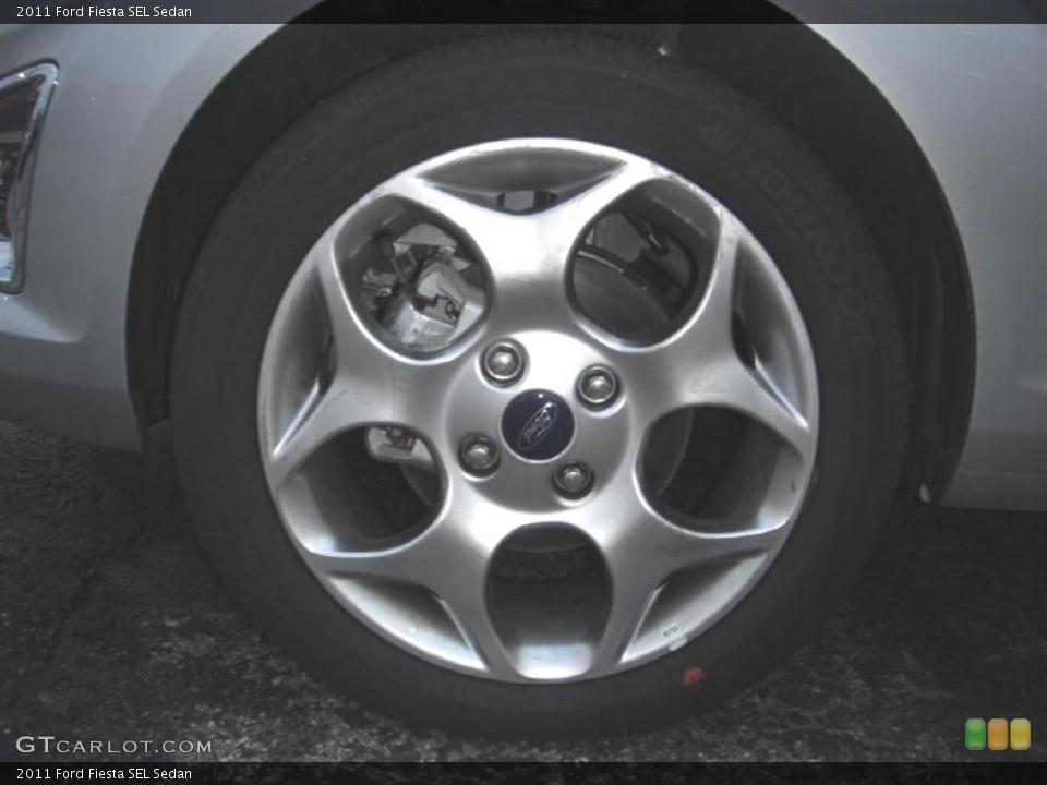2011 Ford Fiesta SEL Sedan Wheel and Tire Photo #46953498