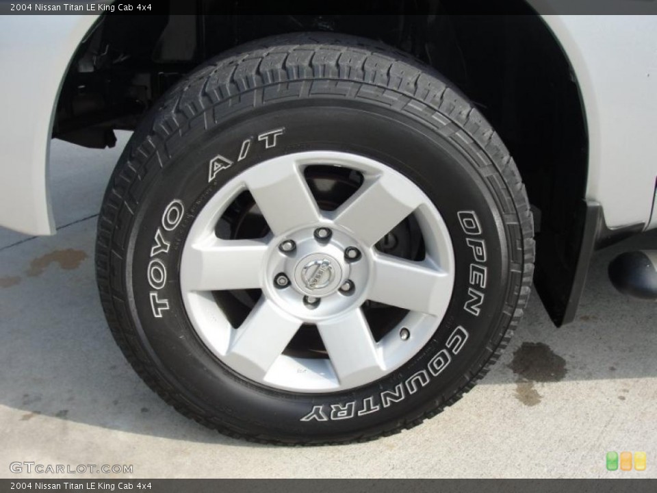 2004 Nissan Titan LE King Cab 4x4 Wheel and Tire Photo #46984602