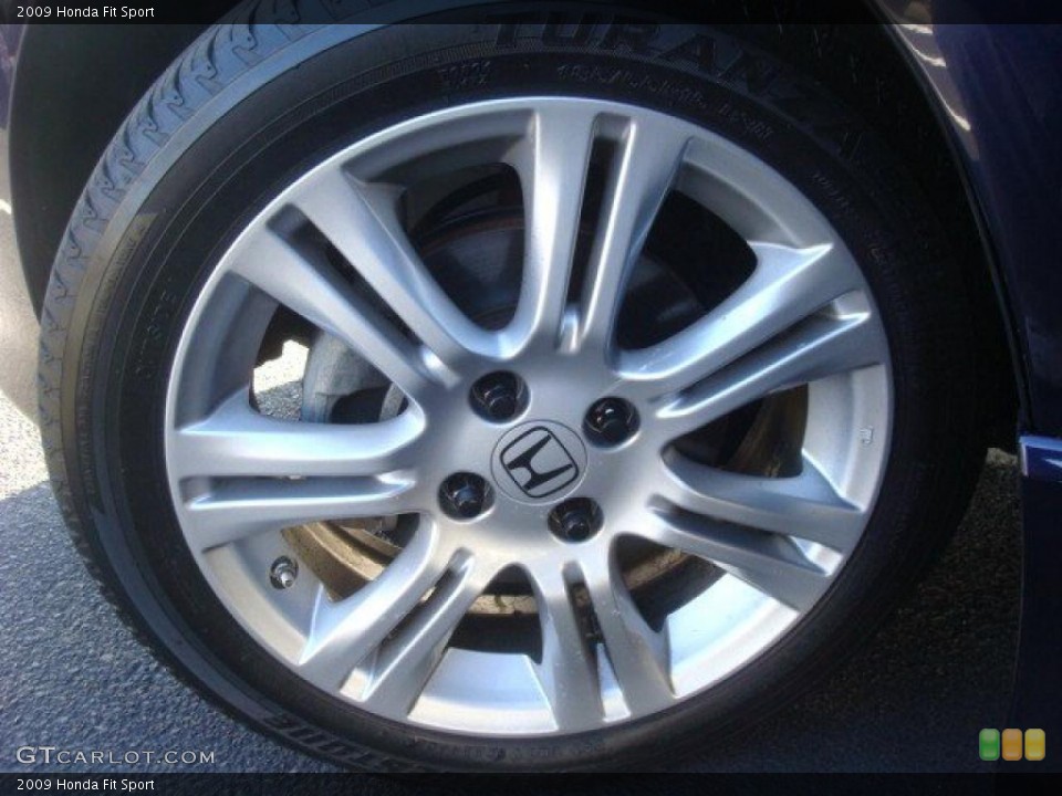 2009 Honda Fit Sport Wheel and Tire Photo #47685091