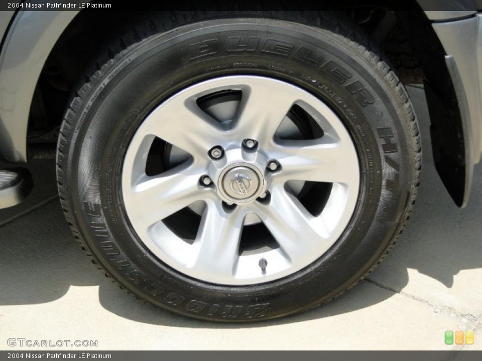 2004 Nissan Pathfinder LE Platinum Wheel and Tire Photo #47850134