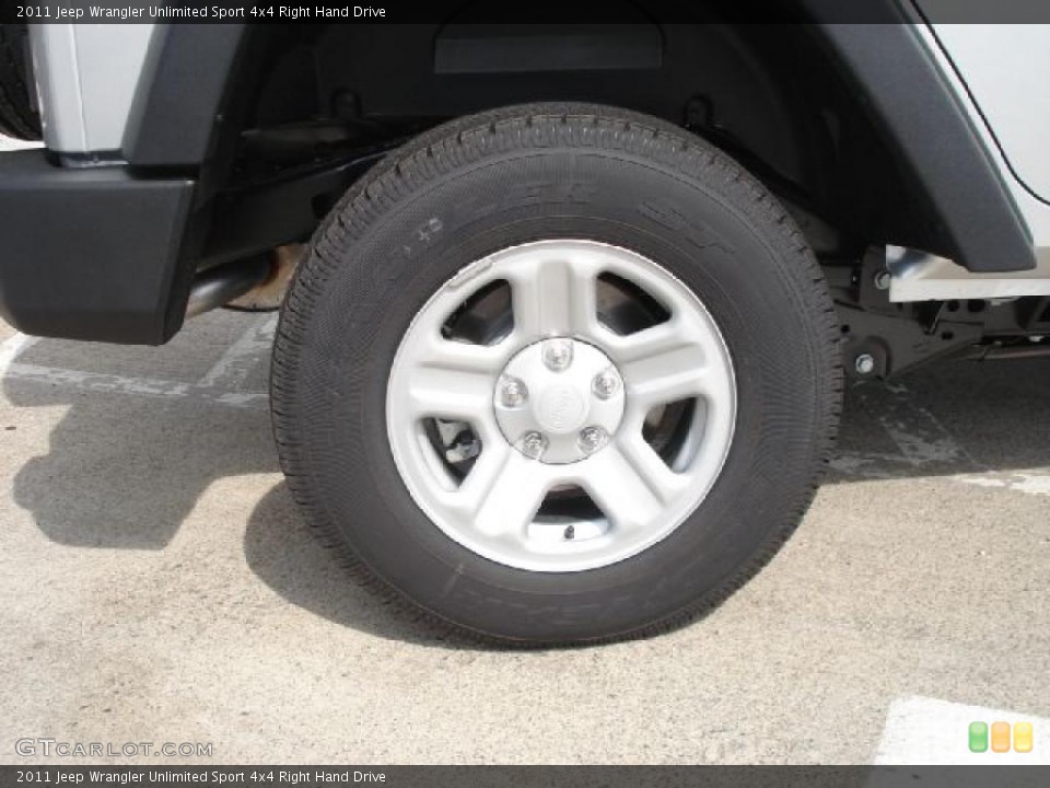 2011 Jeep Wrangler Unlimited Sport 4x4 Right Hand Drive Wheel and Tire Photo #48310015