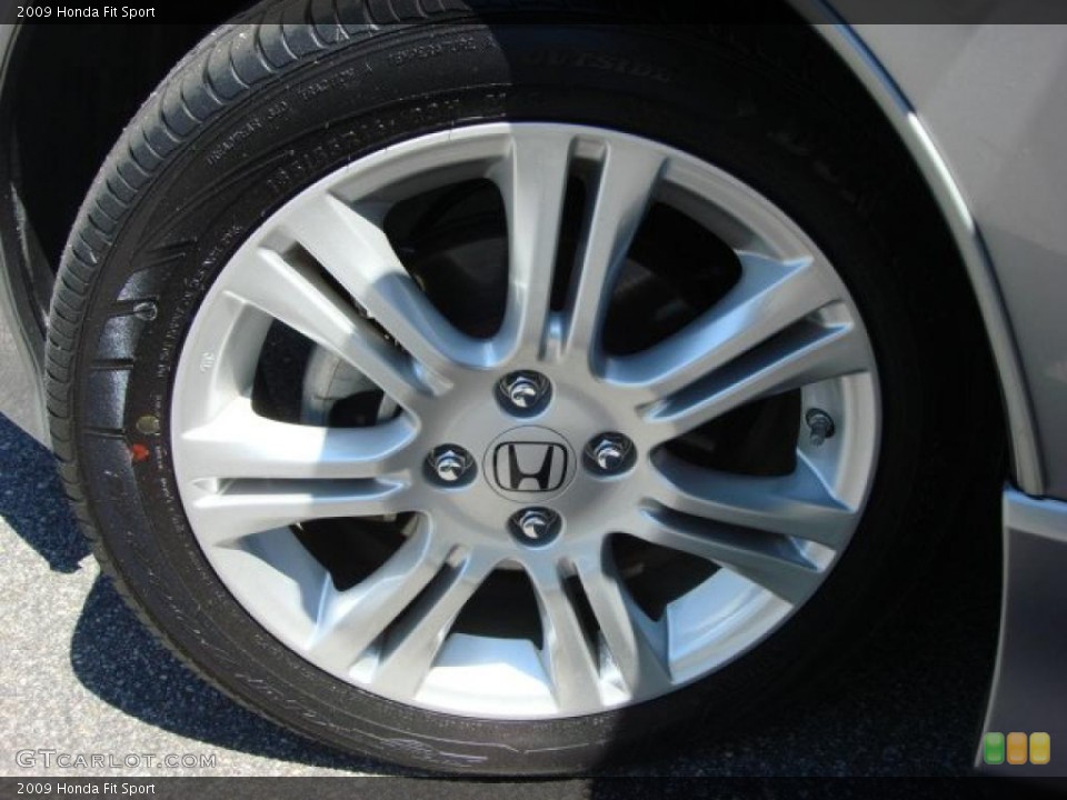 2009 Honda Fit Sport Wheel and Tire Photo #48733938