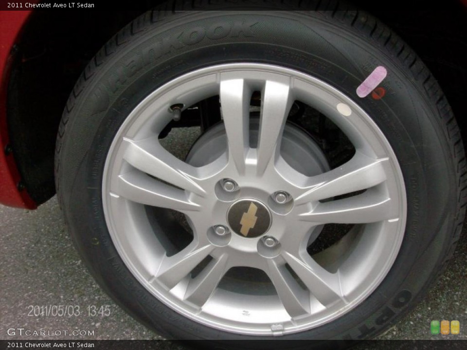 2011 Chevrolet Aveo LT Sedan Wheel and Tire Photo #48818112
