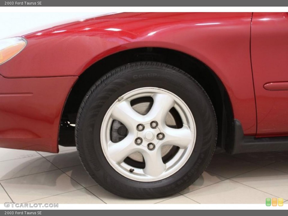 2003 Ford Taurus SE Wheel and Tire Photo #48877782