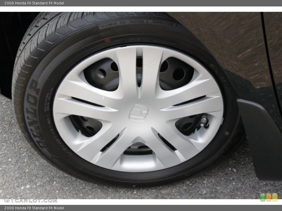 2009 Honda Fit  Wheel and Tire Photo #50399079