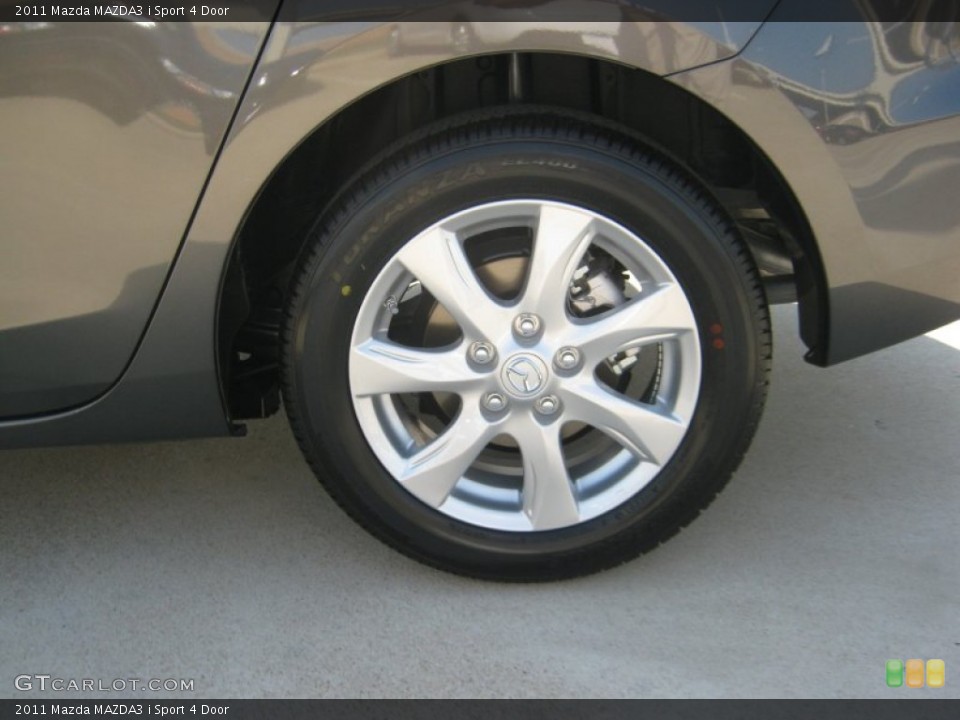 2011 Mazda MAZDA3 i Sport 4 Door Wheel and Tire Photo #50563030