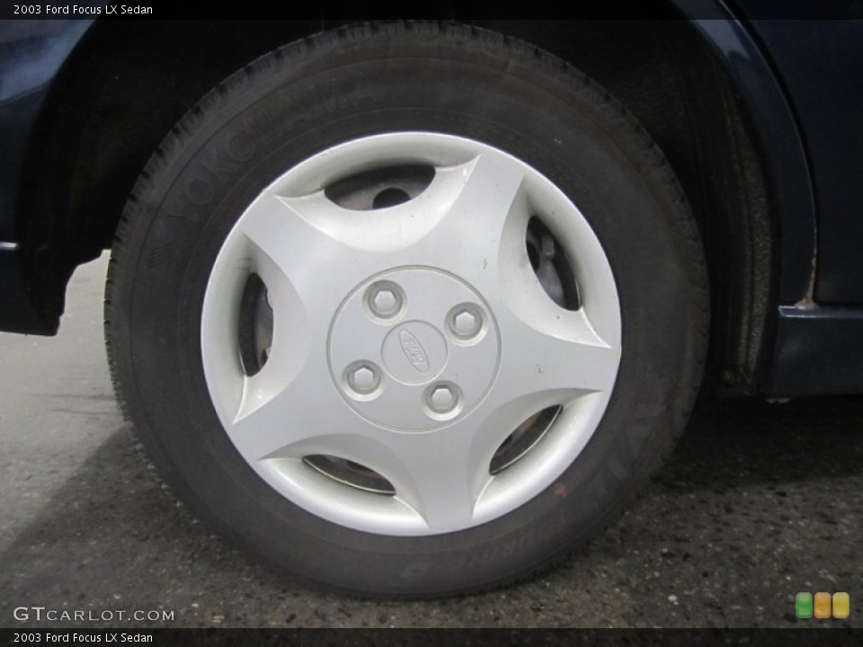 2003 Ford Focus LX Sedan Wheel and Tire Photo #50624811