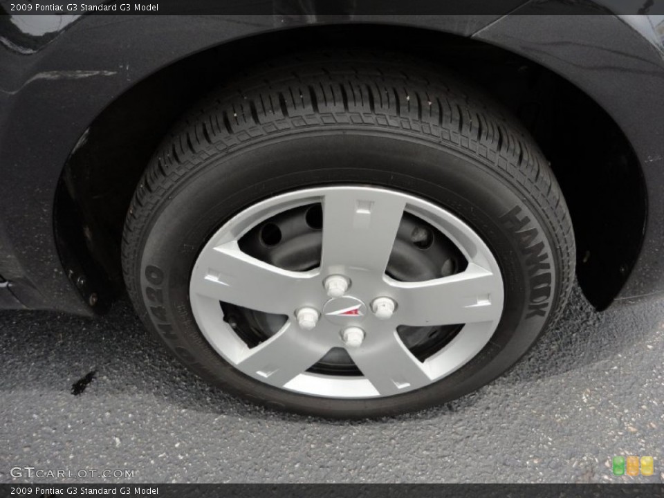 2009 Pontiac G3  Wheel and Tire Photo #50795940