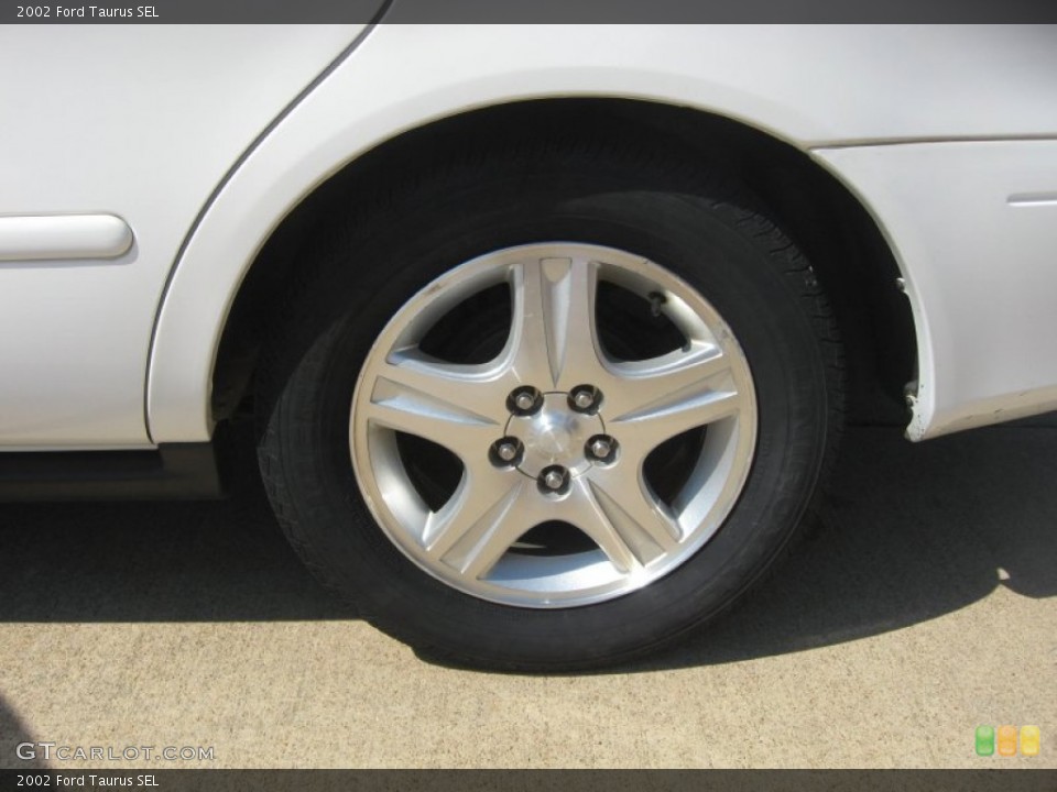 2002 Ford Taurus SEL Wheel and Tire Photo #50902294