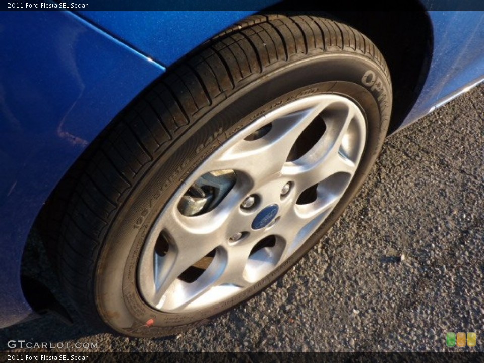 2011 Ford Fiesta SEL Sedan Wheel and Tire Photo #52264138