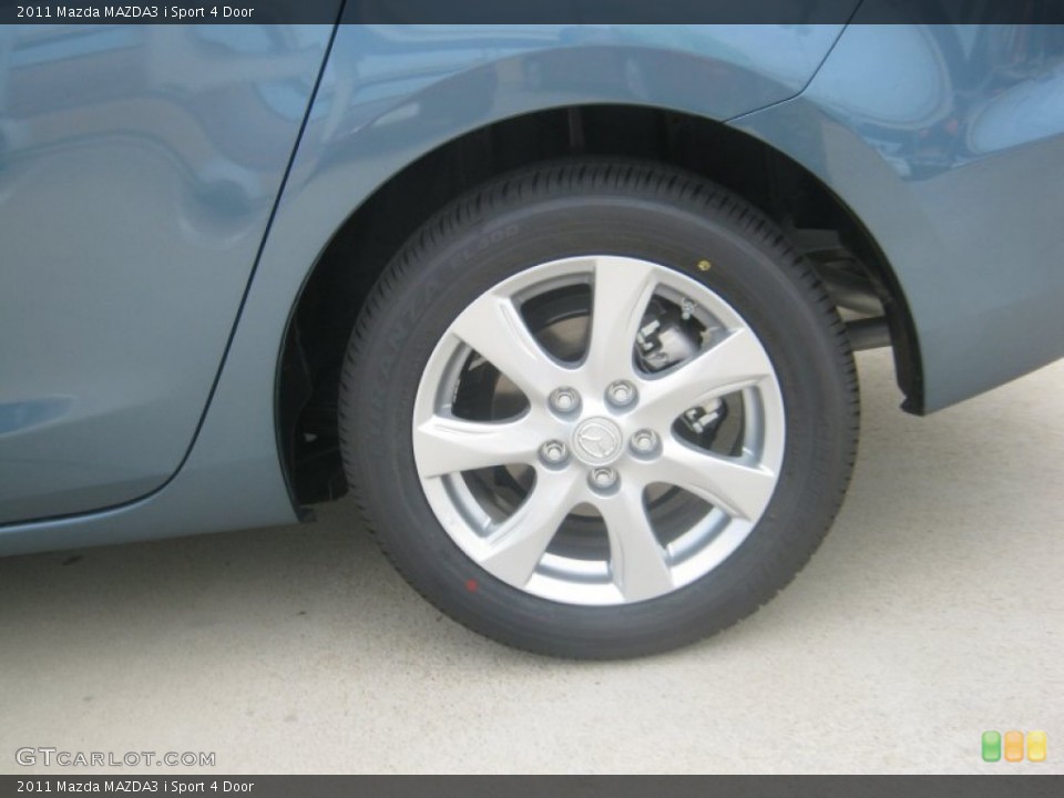 2011 Mazda MAZDA3 i Sport 4 Door Wheel and Tire Photo #52316970