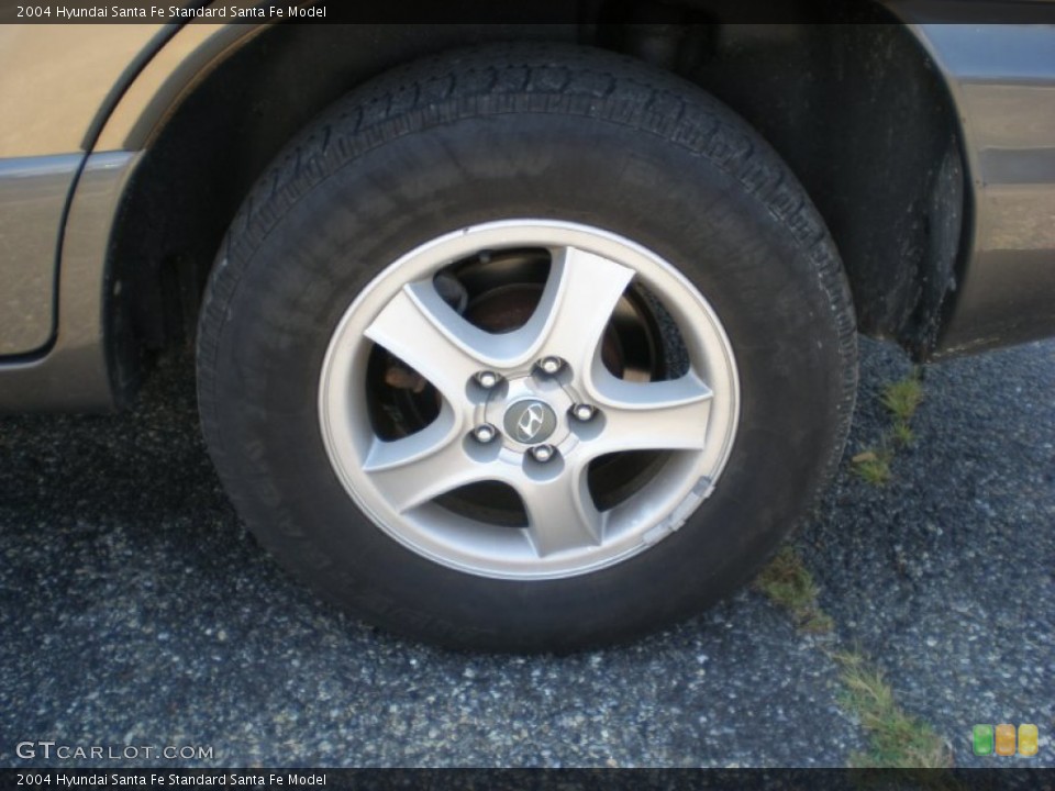 2004 Hyundai Santa Fe  Wheel and Tire Photo #52481780