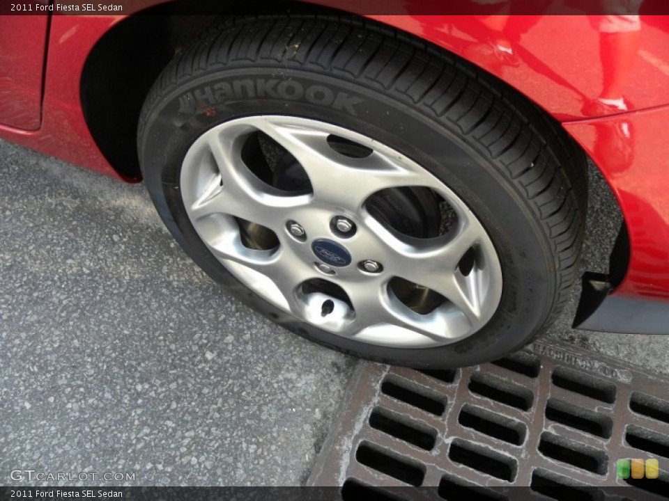 2011 Ford Fiesta SEL Sedan Wheel and Tire Photo #52503621