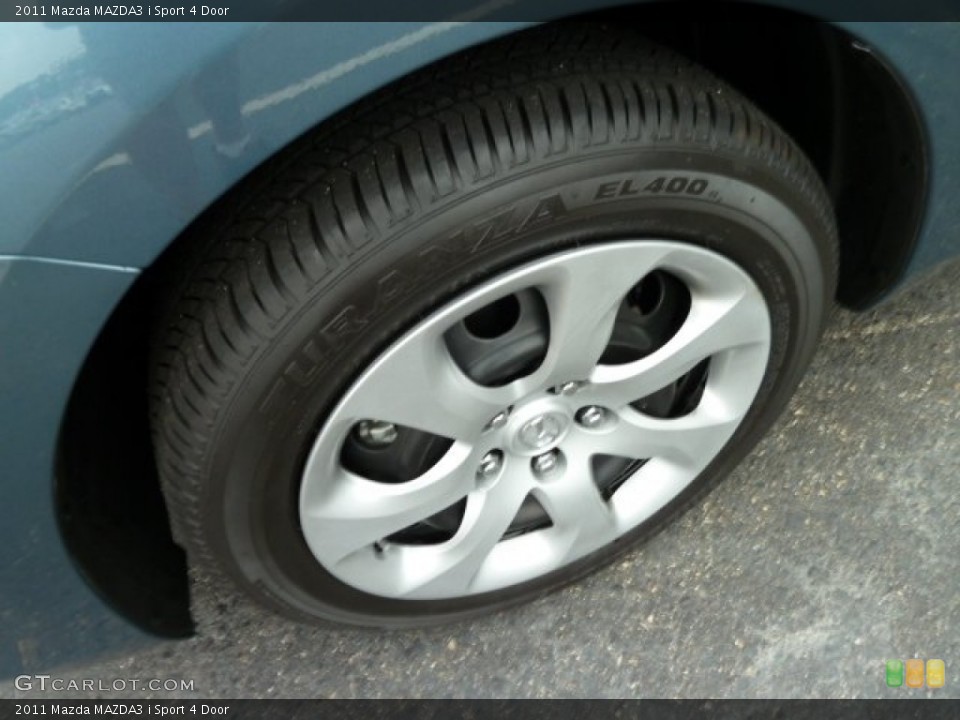2011 Mazda MAZDA3 i Sport 4 Door Wheel and Tire Photo #52534950