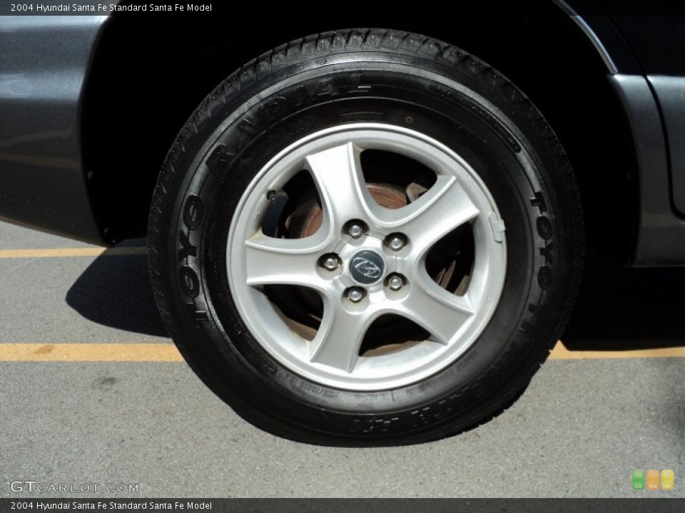 2004 Hyundai Santa Fe  Wheel and Tire Photo #52902522