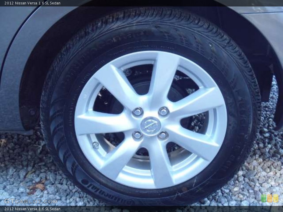 2012 Nissan Versa 1.6 SL Sedan Wheel and Tire Photo #53934637