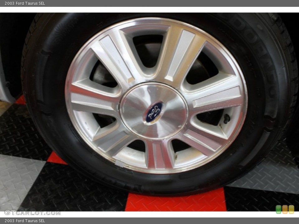 2003 Ford Taurus SEL Wheel and Tire Photo #54275147