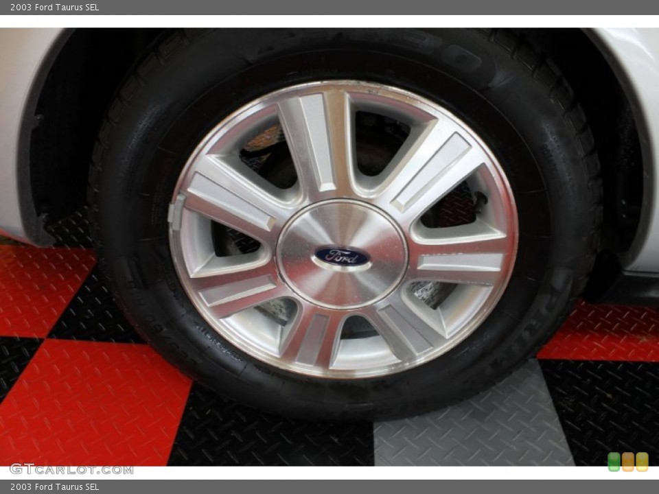2003 Ford Taurus SEL Wheel and Tire Photo #54275162