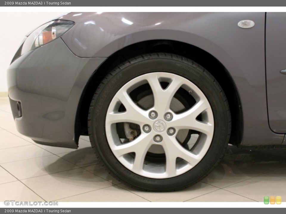 2009 Mazda MAZDA3 i Touring Sedan Wheel and Tire Photo #55701050