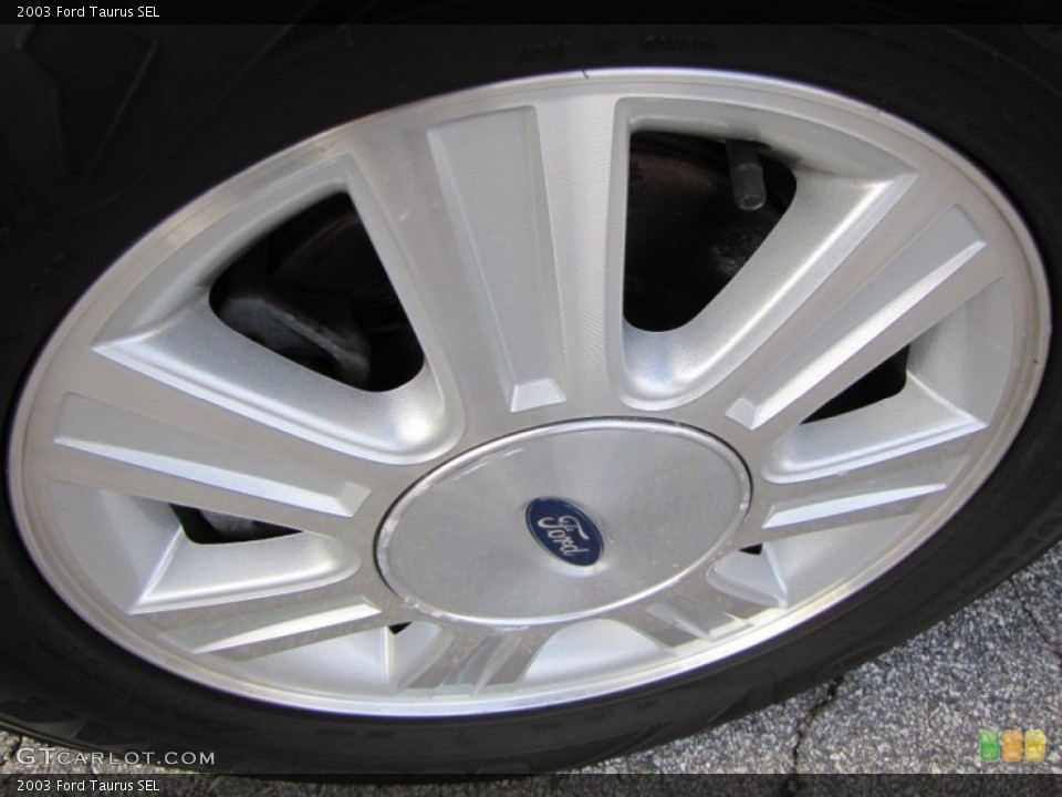 2003 Ford Taurus SEL Wheel and Tire Photo #57205751