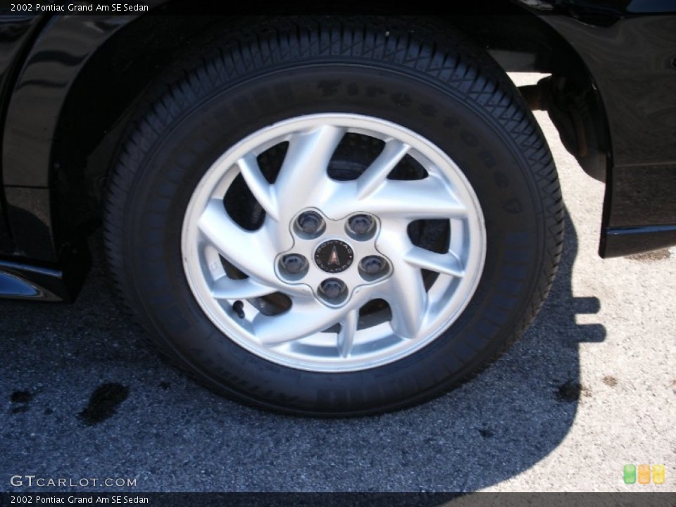 2002 Pontiac Grand Am SE Sedan Wheel and Tire Photo #58031564