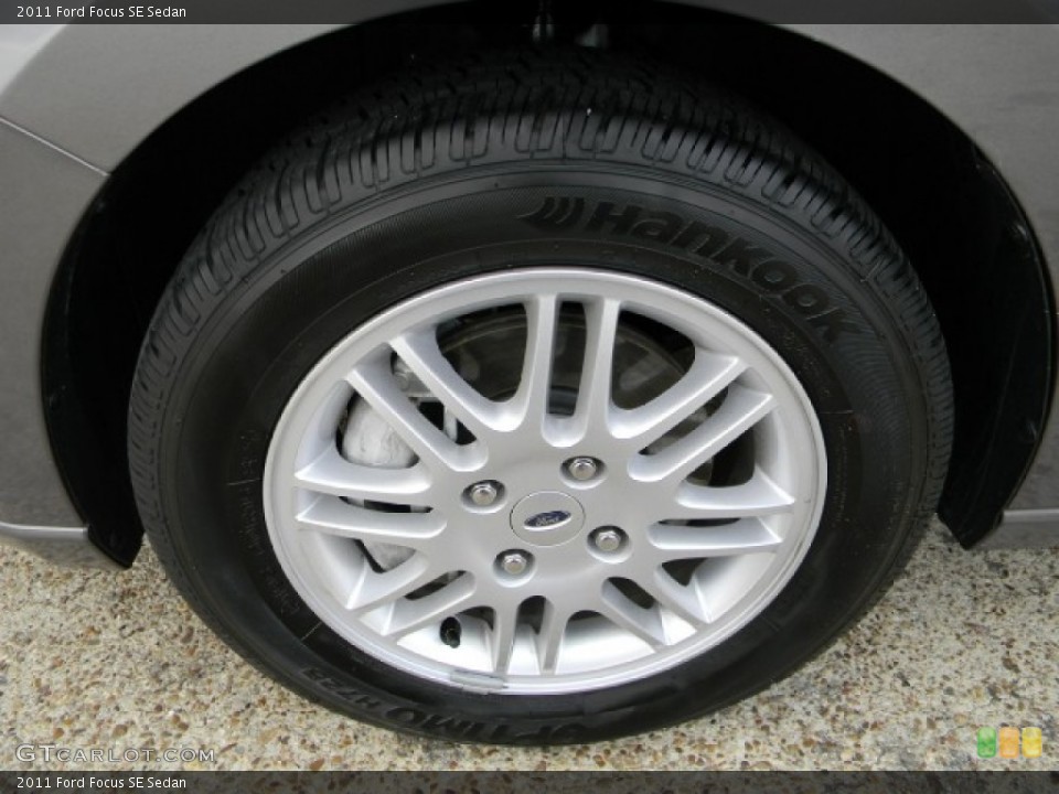 2011 Ford Focus SE Sedan Wheel and Tire Photo #58485725