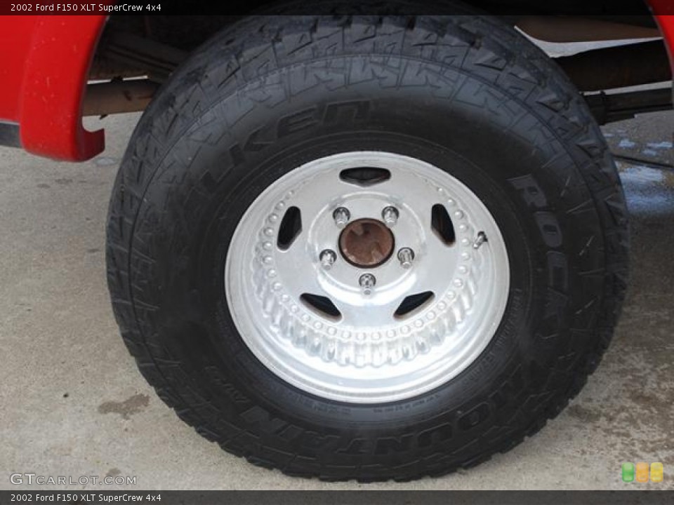 2002 Ford F150 XLT SuperCrew 4x4 Wheel and Tire Photo #58692499