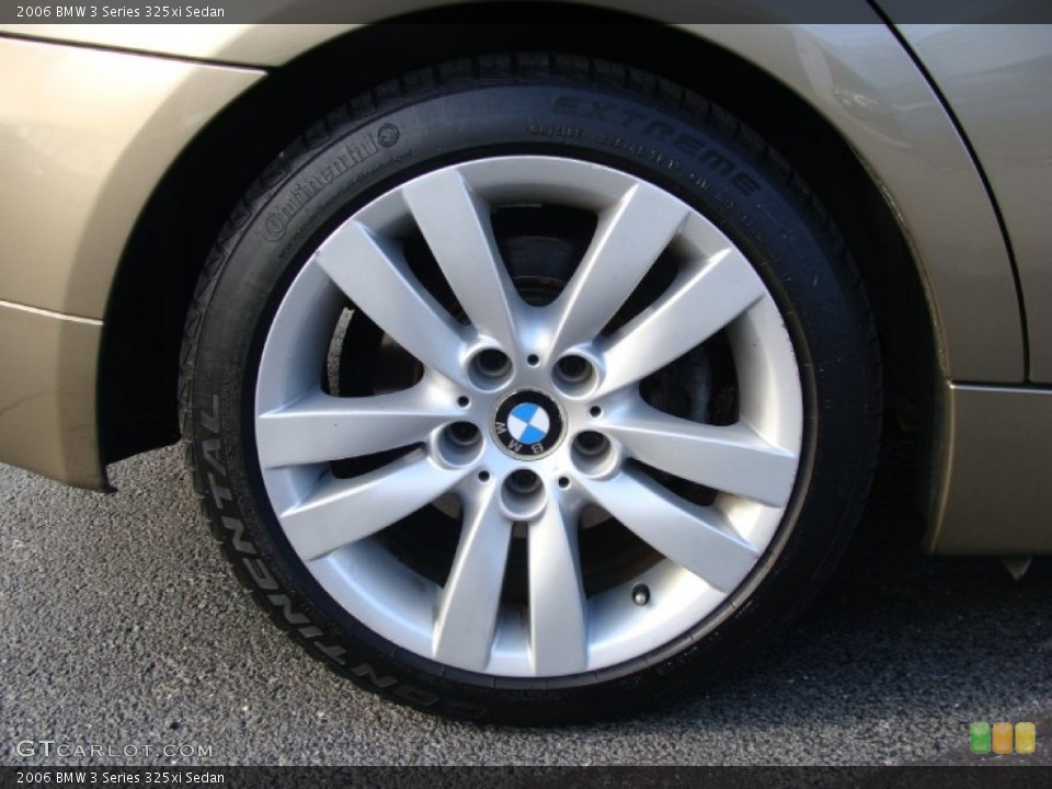 How to change a tire on a bmw 325xi #3