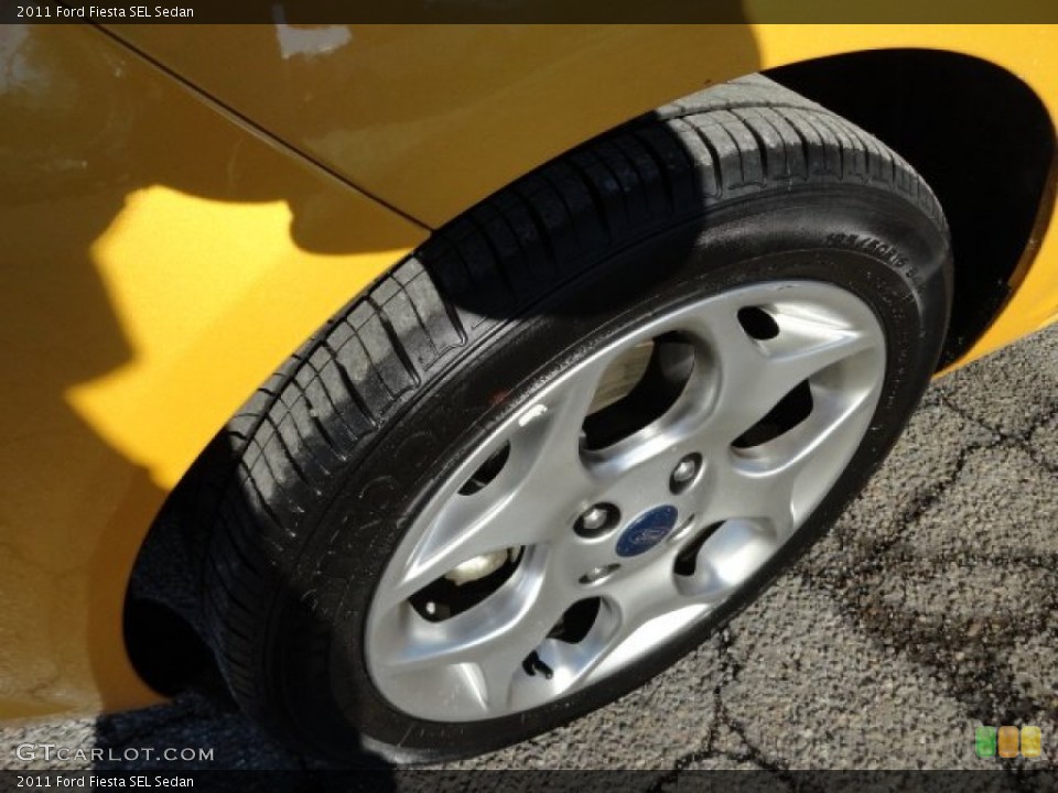 2011 Ford Fiesta SEL Sedan Wheel and Tire Photo #59285673