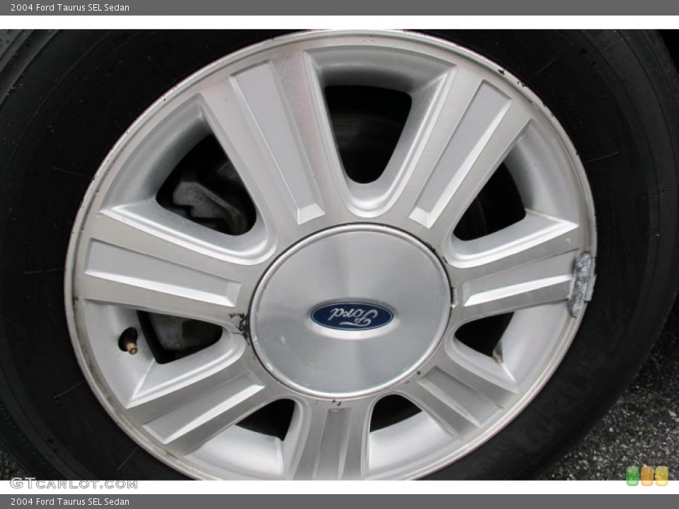 2004 Ford Taurus SEL Sedan Wheel and Tire Photo #59760053