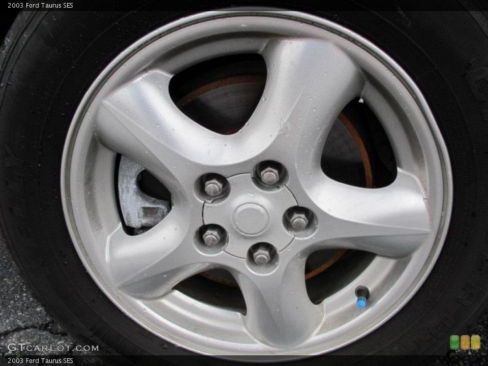 2003 Ford Taurus SES Wheel and Tire Photo #61674064