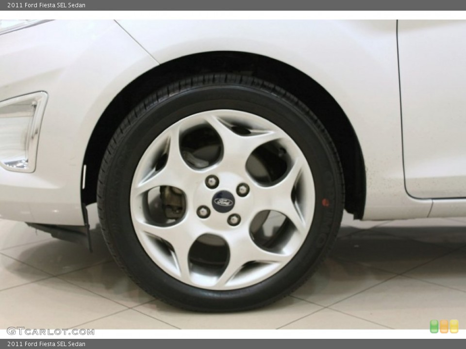 2011 Ford Fiesta SEL Sedan Wheel and Tire Photo #62866847