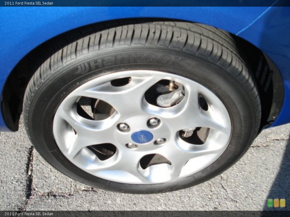2011 Ford Fiesta SEL Sedan Wheel and Tire Photo #63389643