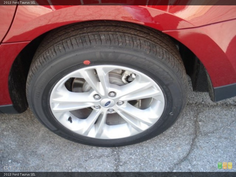 2013 Ford Taurus SEL Wheel and Tire Photo #64097215