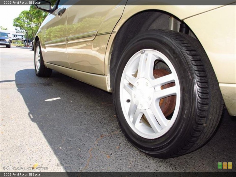 2002 Ford Focus SE Sedan Wheel and Tire Photo #64185748