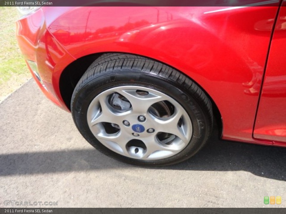 2011 Ford Fiesta SEL Sedan Wheel and Tire Photo #64302570
