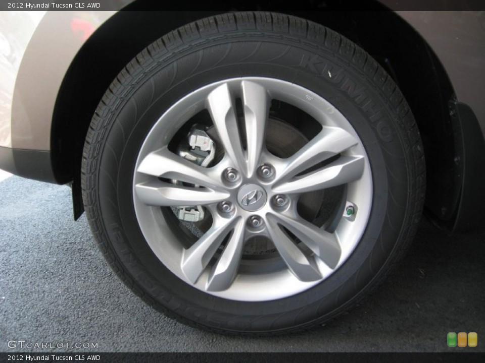 2012 Hyundai Tucson GLS AWD Wheel and Tire Photo #64420208
