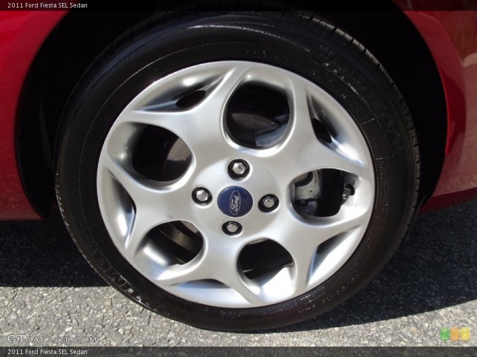 2011 Ford Fiesta SEL Sedan Wheel and Tire Photo #64532976