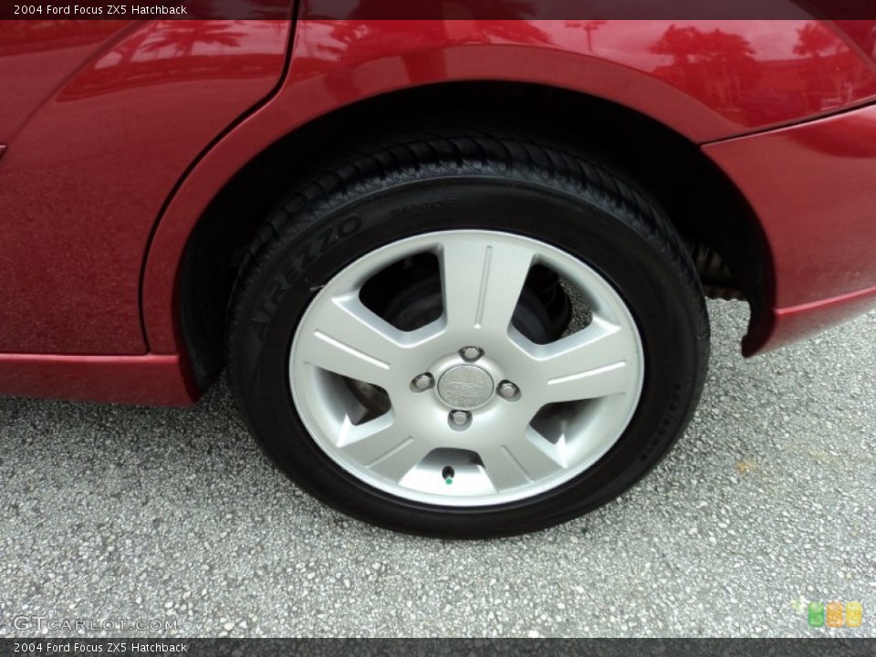 2004 Ford Focus ZX5 Hatchback Wheel and Tire Photo #64631584