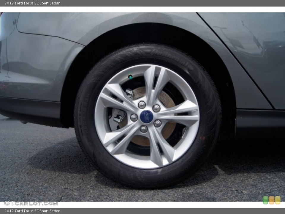 2012 Ford Focus SE Sport Sedan Wheel and Tire Photo #65570852