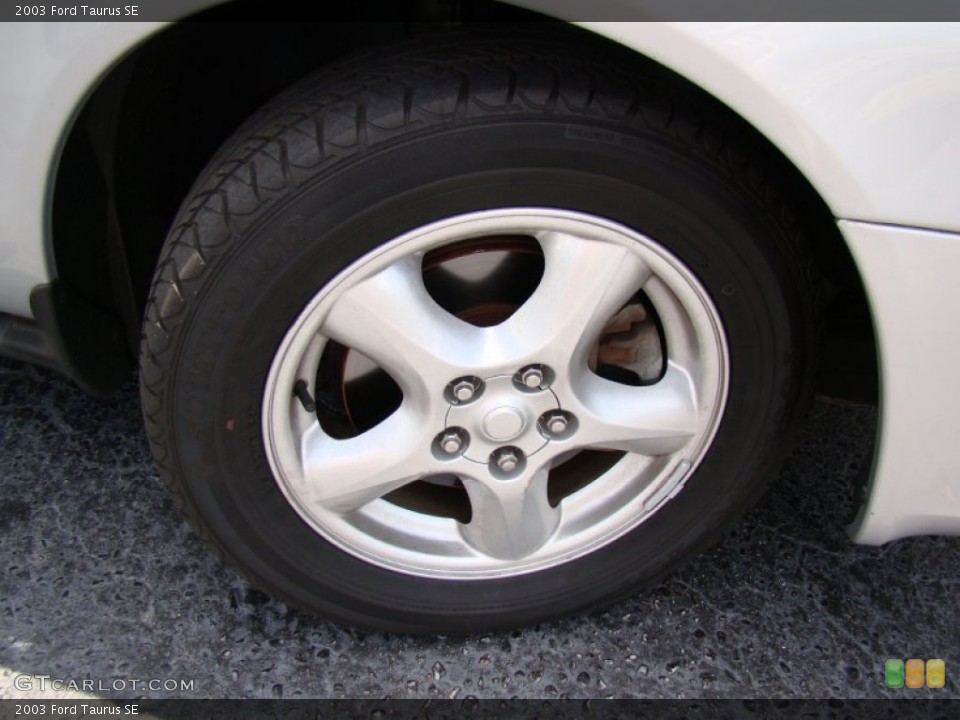 2003 Ford Taurus SE Wheel and Tire Photo #65592536