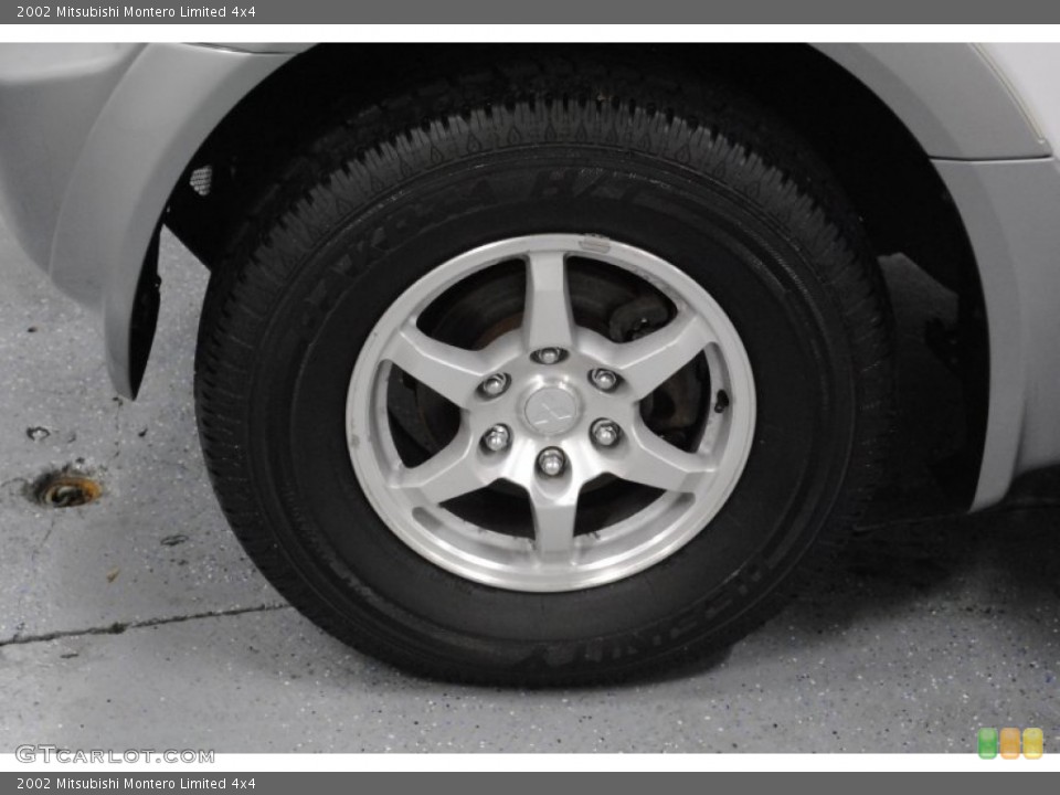 2002 Mitsubishi Montero Limited 4x4 Wheel and Tire Photo #65609026