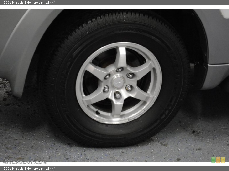 2002 Mitsubishi Montero Limited 4x4 Wheel and Tire Photo #65609038
