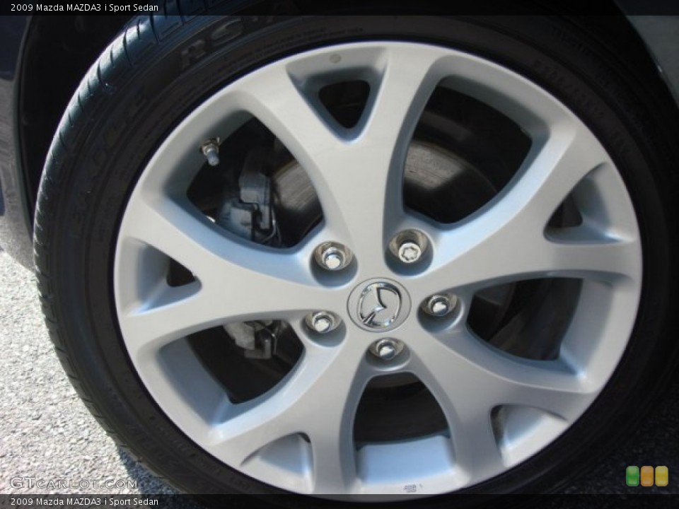2009 Mazda MAZDA3 i Sport Sedan Wheel and Tire Photo #65706887